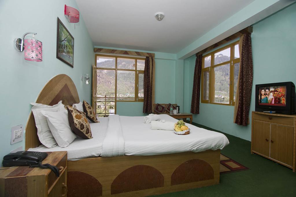 Hotel Ocean Inn Manāli Pokoj fotografie