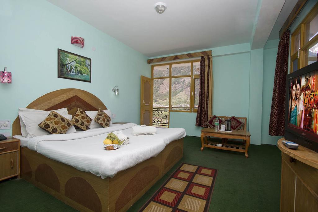 Hotel Ocean Inn Manāli Pokoj fotografie